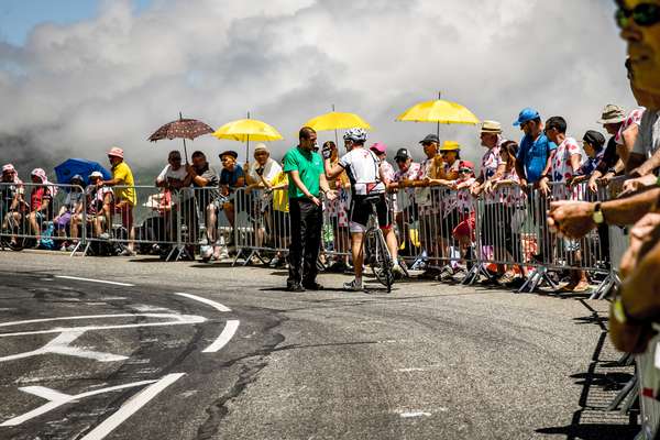 A fan argues with a gendarme on the Col de Peyresourde - Tour de France 2017